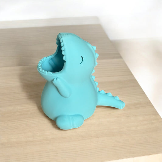 Dinosaur pin holder